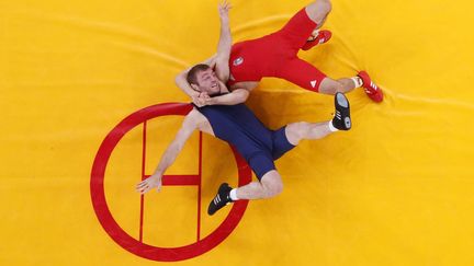 Un combat de lutte lors des Jeux olympiques de Londres, le 7 ao&ucirc;t 2012.&nbsp; (KIM KYUNG HOON / REUTERS)