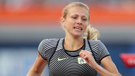 La coureuse du 800 m russe Youlia Stepanova lors des championnats d'Europe d'athlétisme à Amsterdam le 6 juillet 2016. Sur son dossard, on peut lire (en anglais): «I run clean» («Je cours propre»)... (AFP - DPA - Michael Kappeler)