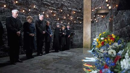 &nbsp; (La chancelière allemande Angela Merkel (2-G) participe le 3 mai 2015 aux commémorations de la libération du camp de concentration de Dachau (sud de l'Allemagne) il y a 70 ans © Maxppp)