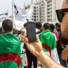 Mehdi Alioui, journaliste au HuffPost Algérie, lors d'une manifestation des étudiants, le 27 juin 2019, à Alger. (CLEMENT PARROT / FRANCEINFO)