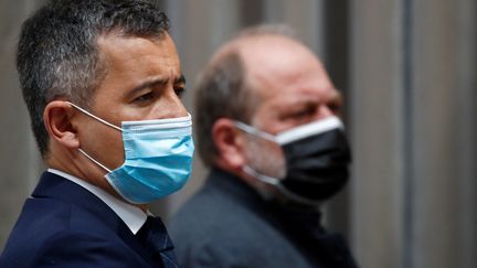 Le ministre de l'Intérieur Gérald Darmanin et le ministre de la Justice Eric Dupond-Moretti à l'Elysée, à Paris, le 28 avril 2021. (GONZALO FUENTES / AFP)