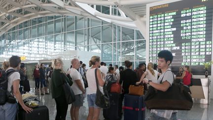 &nbsp; (Des milliers de touristes sont bloqués à l'aéroport Ngurah Rai de Bali, le 10 juillet 2015 © MAXPPP)