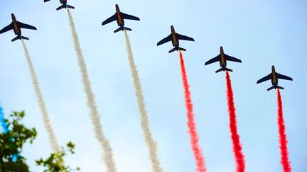 La Patrouille de France, le 14 juillet 2012, au-dessus de Paris.&nbsp; (FRÉDÉRIC SOREAU / PHOTONONSTOP)