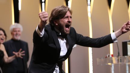 Ruben Ostlund après avoir remporté la Palme d'or.
 (ALBERTO PIZZOLI / AFP)