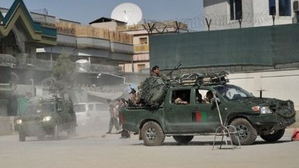 Des forces spéciales afghanes arrivent sur les lieux d'une attaque des talibans à Kaboul le 15 avril 2012 (AFP - Bay ISMOYO)