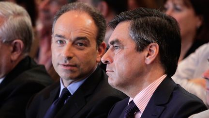 Les deux candidats &agrave; la pr&eacute;sidence de l'UMP, Jean-Fran&ccedil;ois Cop&eacute; et Fran&ccedil;ois Fillon, le 26 mai 2012 &agrave; Paris. (VINCENT ISORE / MAXPPP)