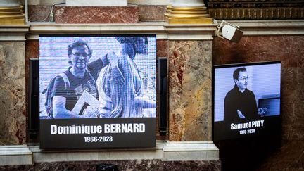 Une photo de Dominique Bernard diffusée à l'Assemblée nationale, à Paris, le 17 octobre 2023. (XOSE BOUZAS / AFP)