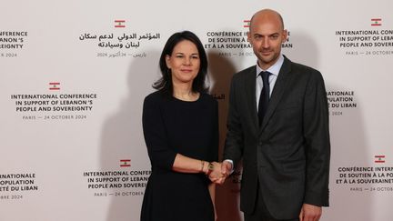 Le ministre des Affaires étrangères français Jean-Noël Barrot et son homologue allemande Annalena Baerbock, à Paris le 24 octobre 2024. (ALAIN JOCARD / AFP)