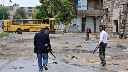 Des rebelles syriens dans la ville d'Alep (Syrie), en mai 2013. (AFP)