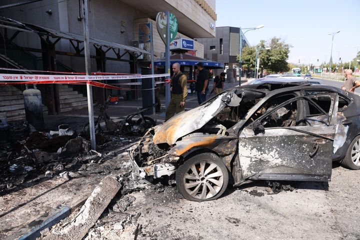 A car destroyed in Kiryat Shmona (northern Israel) by a rocket fired from Lebanon, November 3, 2023. (JALAA MAREY / AFP)