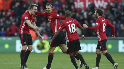 Manchester United retrouve le sourire (GEOFF CADDICK / AFP)