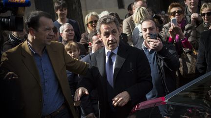 L'ancien chef de l'Etat, Nicolas Sarkozy, lors du premier tour des &eacute;lections municipales, le 23 mars 2014. (MAXPPP)