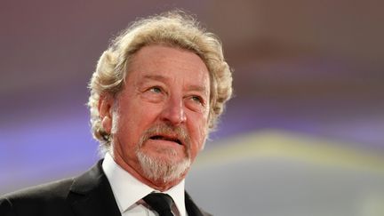 Robert Guédiguian à la Mostra de Venise pour la projection de son film "Gloria Mundi", le 5 septembre 2019 (ALBERTO PIZZOLI / AFP)