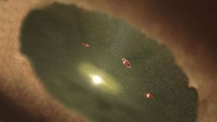 Capture d'écran d'une vidéo YouTube de l'université d'Arizona (Etats-Unis) représentant, dans une vue d'artiste,&nbsp;des exoplanètes en formation. (UNIVERSITY OF ARIZONA)