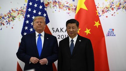 Donald Trump et Xi Jinping lors de leur sommet bilatéral en marge du G20, à Osaka, le 29 juin 2019 (BRENDAN SMIALOWSKI / AFP)