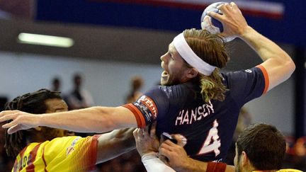 Mikkel Hansen (PSG) face à Barcelone (FRANCK FIFE / AFP)