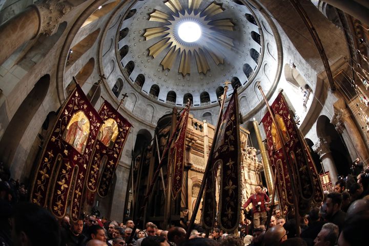 Le tombeau du Christ au Saint-Sépulcre attirent des millions de chrétiens chaque année. Ici la cérémonie de la flamme sacrée de la communauté orthodoxe
 (THOMAS COEX / AFP)