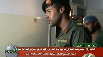 Khamis Kadhafi lors de la visite d'un hôpital libyen, le 9 juin 2011. (LIBYAN TV / AFP)