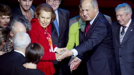 Liliane Bettencourt et Patrice de Maistre, au musée du quai Branly, le 18 octobre 2010. (AFP - Fred Dufour)