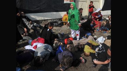 Massoud Hossaini de l&#039;AFP a obtenu le prix Pulitzer 2012 avec cette photo.
 (Massoud Hossaini / AFP)