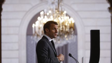 Le président de la République, Emmanuel Macron, lors de la sixième Conférence nationale du handicap, à l'Elysée, le 26 avril 2023. (YOAN VALAT / AFP)