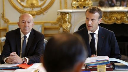 Gérard Collomb et Emmanuel Macron, lors du Conseil des ministres du 3 août 2018. (MICHEL EULER / POOL)