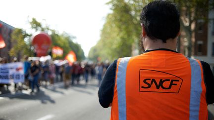 An SNCF employee on strike, October 13, 2023, in Toulouse.  (Alain Pitton/NurPhoto/AFP)