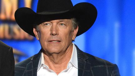 George Strait George Strait à la cérémonie des Country Music Awards 2014
