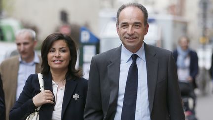 Le d&eacute;put&eacute; Jean-Fran&ccedil;ois Cop&eacute; et sa femme Nadia arrivent au QG de l'UMP lors du second tour des &eacute;lections municipales, le 30 mars 2014. (PATRICK KOVARIK / AFP)