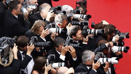 Photographes sur le tapis rouge du Festival de Cannes
 (YVES HERMAN / POOL / AFP)