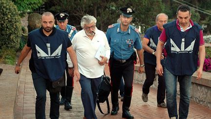 Giuseppe Mandara lors de son arrestation &agrave; Naples, en Italie, le 17 juillet 2012. (ITALIAN POLICE / AFP)