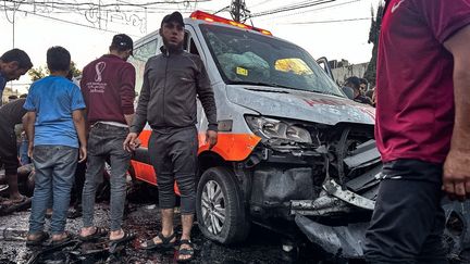 The wreckage of an ambulance destroyed by a strike in front of Al-Shifa hospital in Gaza, November 3, 2023. (MOMEN AL-HALABI / AFP)