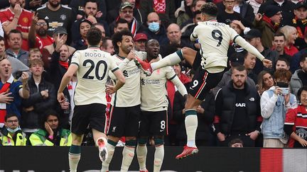 Les joueurs de Liverpool ont pulvérisé Manchester United (5-0) à Old Trafford, le 24 octobre 2021.&nbsp; (OLI SCARFF / AFP)