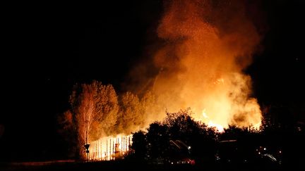 &nbsp; (Une entreprise qui fabrique des palettes de bois à Persan a été incendiée © Thomas SAMSON / AFP)