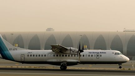 Un ATR-72 iranien sur le tarmac de l'aéroport de Dubaï, le 29 juillet 2008. (MARWAN NAAMANI / AFP)