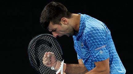 Le Serbe Novak Djokovic à l'occasion du troisième tour de l'Open d'Australie, face au Bulgare Grigor Dimitrov, le 21 janvier 2023. (MARTIN KEEP / AFP)