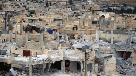 Des immeubles d&eacute;truits &agrave; Alep (Syrie) par des raids a&eacute;riens, le&nbsp;23 mai 2014. (SALIH MAHMUD LEYLA / ANADOLU AGENCY / AFP)