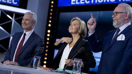 Claude Bartolone, Valérie Pécresse et Wallerand de Saint-Just, le 9 décembre 2015, lors d'un débat télévisé sur i-Télé. (KENZO TRIBOUILLARD / AFP)