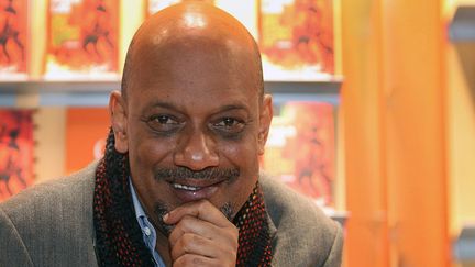 Paulo Lins est l'un des romanciers brésiliens invités au salon du livre 2015
 (DANIEL ROLAND / AFP)