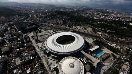 Il a fallu plus de trois ans et 430 millions d’euros pour rénover ce stade mythique inauguré en 1950 qui à l'époque pouvait contenir 250.000 personnes. Le 2 juin 2013, la Coupe des Confédérations, a inauguré sa réouverture. Ce temple du football brésilien peut accueillir près de 79.000 spectateurs. Sept matchs du Mondial dont la finale s’y dérouleront. Dans ce stade nouvelle génération, l’eau pour les sanitaires et l’arrosage de la pelouse sont fournis grâce aux pluies récupérées. En 2016, s’y dérouleront les cérémonies d’ouverture et de clôture des Jeux olympiques d’été à Rio de Janeiro. (  REUTERS / Ricardo Moraes)