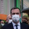 Le ministre de la Santé, Olivier Véran, au cours d'une visite à Lille, le 10 décembre. (HELENE DECAESTECKER / HANS LUCAS)