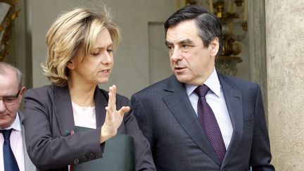 Val&eacute;rie P&eacute;cresse et Fran&ccedil;ois Fillon, tous deux candidats aux l&eacute;gislatives de 2012, &agrave; la sortie de l'Elys&eacute;e &agrave; Paris en mars 2011. (ALAIN AUBOIROUX / LE PARISIEN / MAXPPP)