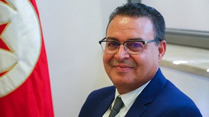 Secretary General of the Popular Movement party Zouhair Maghzaoui poses for a photo as he waits to file his candidacy for the October 6 presidential election, in Tunis, Tunisia, on August 6, 2024. (HASNA / AFP)