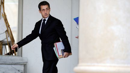 Le pr&eacute;sident de la R&eacute;publique, Nicolas Sarkozy, &agrave; la sortie du Conseil des ministres, &agrave; Paris, le 7 d&eacute;cembre 2011. (ERIC FEFERBERG / AFP)