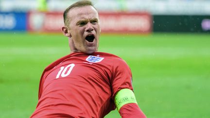 Wayne Rooney rentre dans l'histoire du foot anglais (JURE MAKOVEC / AFP)