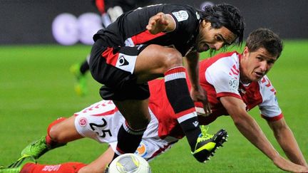 Radamel Falcao (Monaco) et Anthony Weber (Reims)