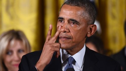 Barack Obama en larmes lors de la présentation de son plan anti-armes