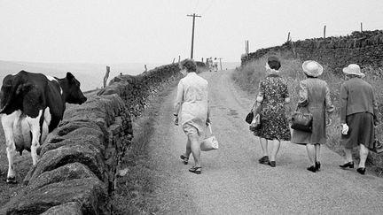 Congregation making their way to the Crimsworth Dean Methodist Chapel Anniversary service
 (Martin Parr / Magnum Photos)