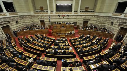 Syriza compte d&eacute;sormais 145 si&egrave;ges &agrave; la Vouli, le Parlement grec. (LOUISA GOULIAMAKI / AFP)