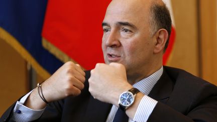 Le ministre de l'Economie et des Finances, Pierre Moscovici, le 30 janvier 2014 dans son minist&egrave;re, &agrave; Paris. (CHARLES PLATIAU / REUTERS )